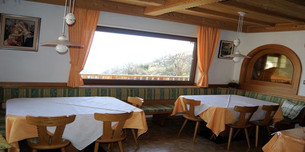 Frühstück- und Aufenthaltsraum im Gasthaus Alpenflora /